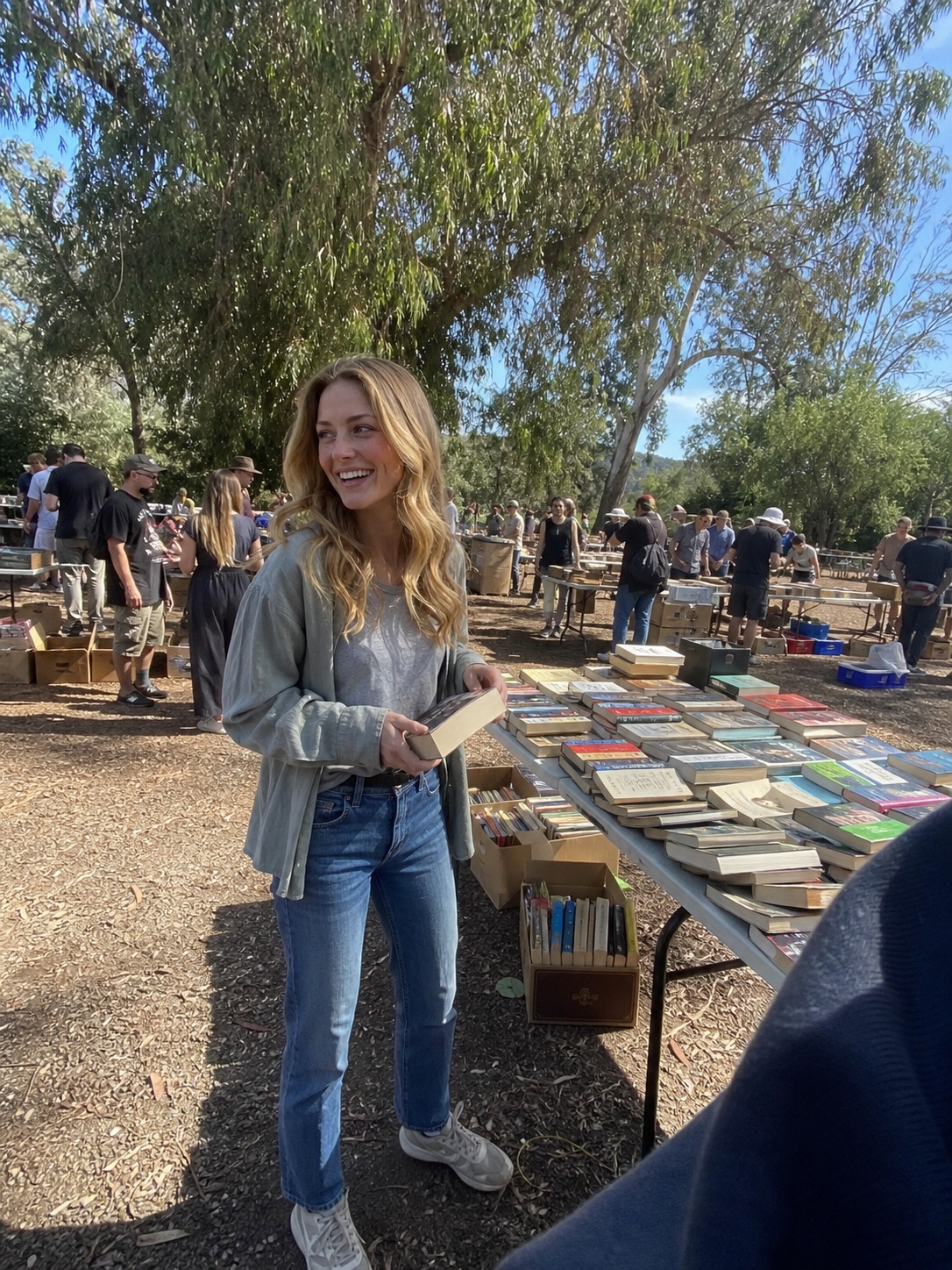 Casey Brennan browsing a weekend book market